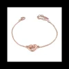 Boccadamo Bracciale placcato oro rosa con cuore traforato centrale