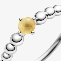 Pandora anello color miele decorato con sfere