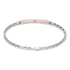 Zancan - Bracciale a grumetta in argento con targa ed inserti in oro rosa.